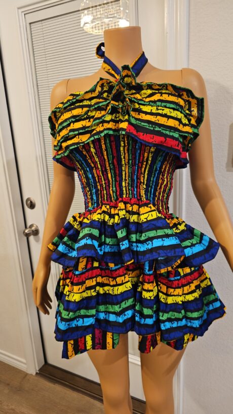 SADE – Smokey Ankara is the art of quiet opulence. Deep, muted tones meet exquisite craftsmanship, creating a silhouette that commands attention without asking for it.