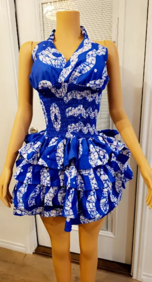 The Amani Royal Blue Cap Gown, meaning “peace,” is a stunning smokey Ankara