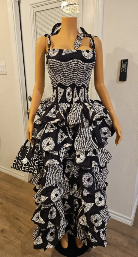 Zola Step Ruffle Gown — elegance, in motion.