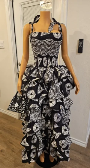 Zola Step Ruffle Gown — elegance in motion.