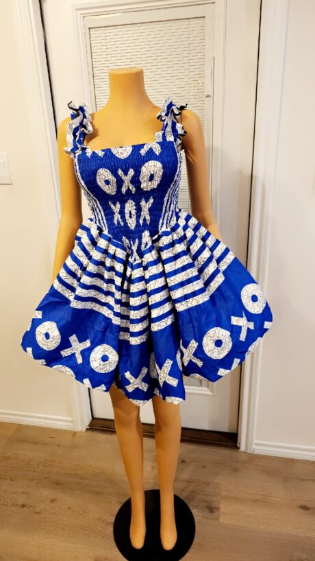 XOXO SMOKE blue Ankara piece featuring bold XOXO print and dramatic smokey shape