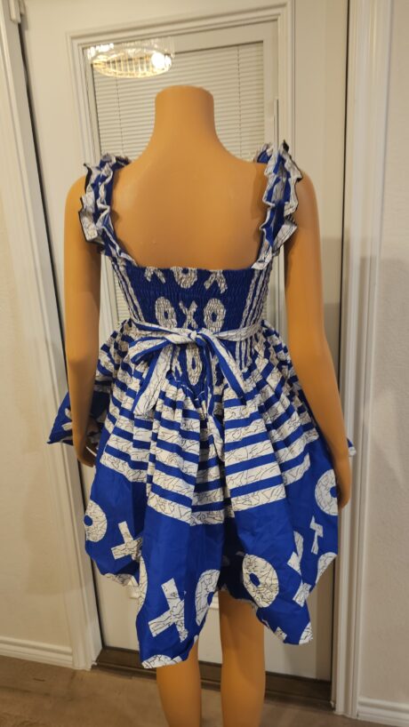 XOXO SMOKE blue Ankara piece featuring bold XOXO print and dramatic smokey shape